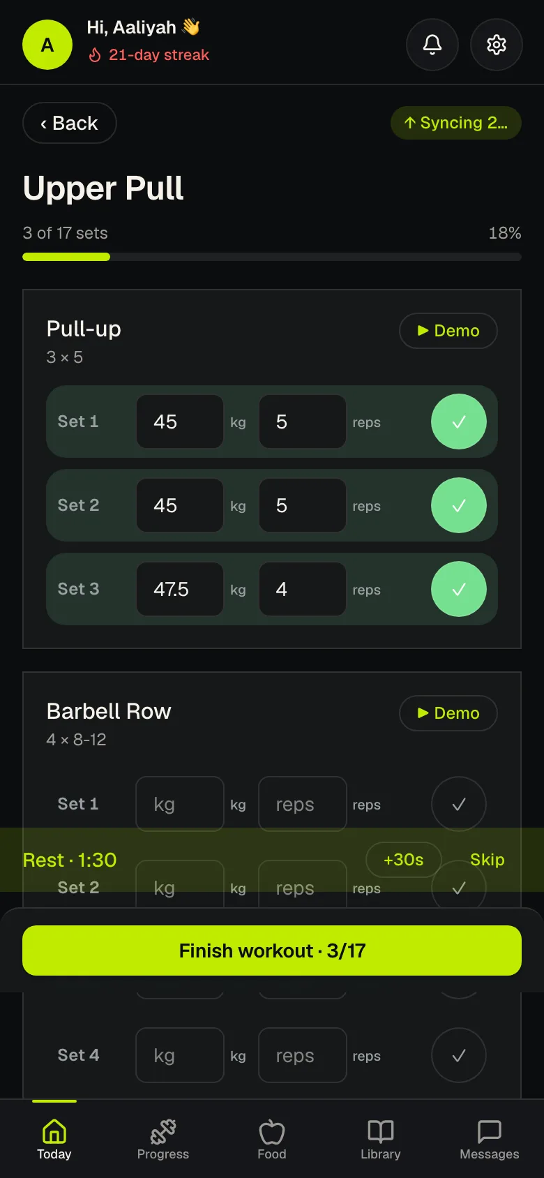 Logging a workout on the phone. Sets checked off as they're completed.